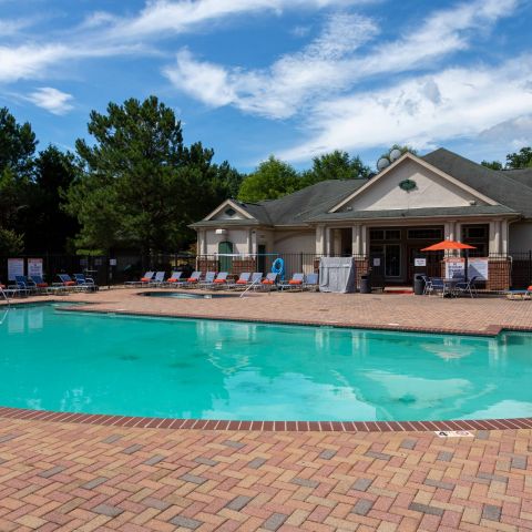 Attain at Chic's Beach Smiling resident on a beach at sunset