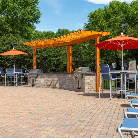 Attain at Chic's Beach Smiling resident on a beach at sunset