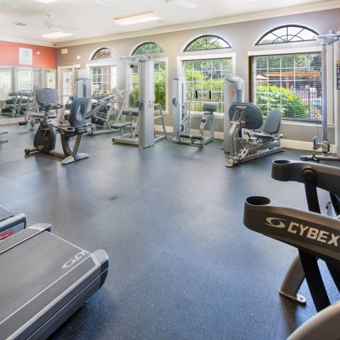 Attain at Chic's Beach Magazine and dried flowers on a stone coffee table